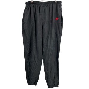 Nike Black Jogger Track Pants with Red Swoosh